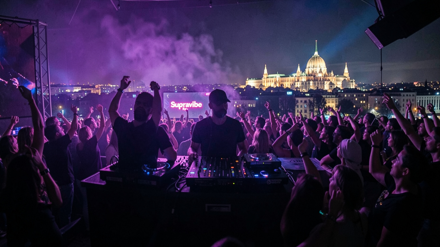 A Bucharest rooftop club at night with a DJ booth and an LED screen reading Supravibe Radio