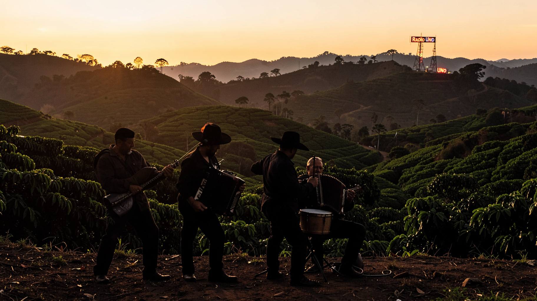 A vallenato trio silhouette playing on a hillside above Pereira