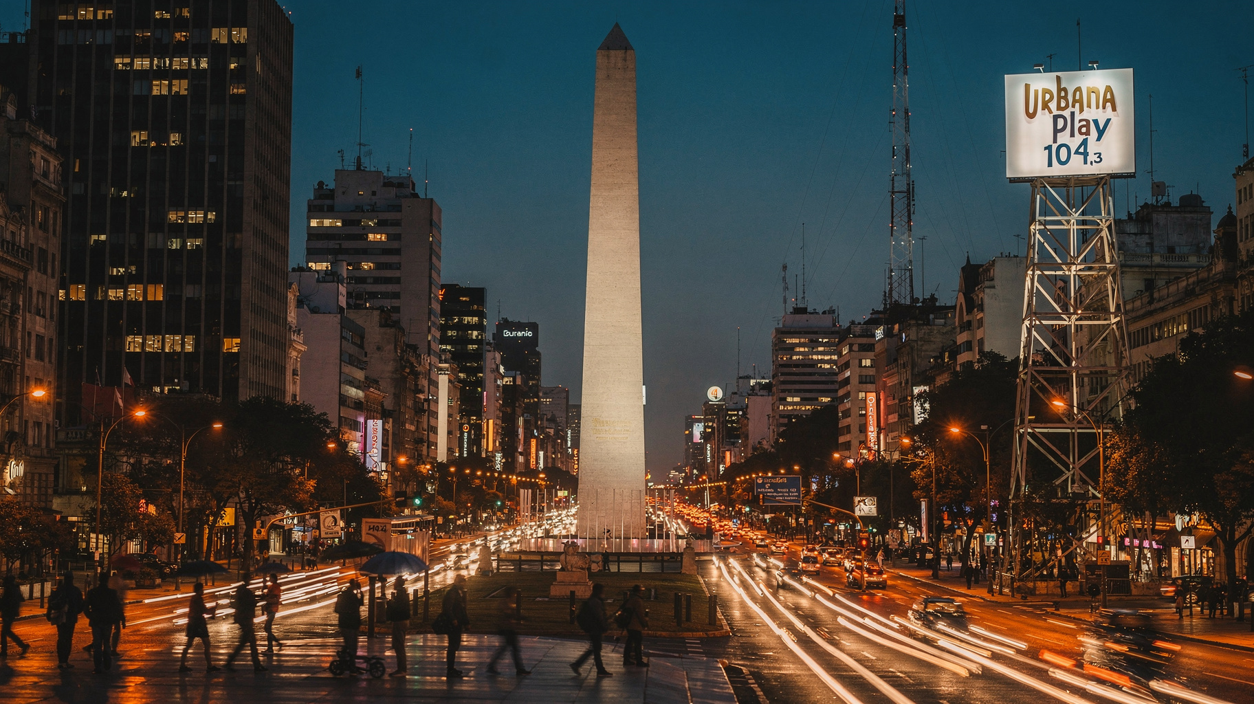 The Obelisco of Buenos Aires at dusk beside a radio tower with a sign reading Urbana Play 104.3, inspired by Urbana Play 104.4