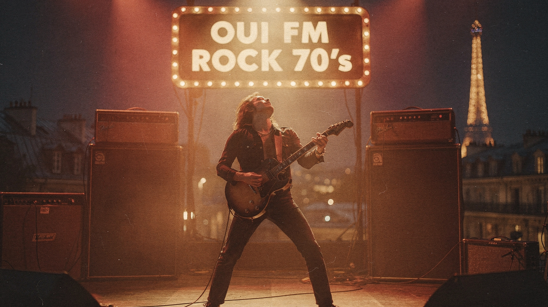A retro 1970s rock concert stage with a guitarist silhouette and the Paris skyline behind a marquee reading OUI FM ROCK 70's, inspired by OUI FM ROCK 70's