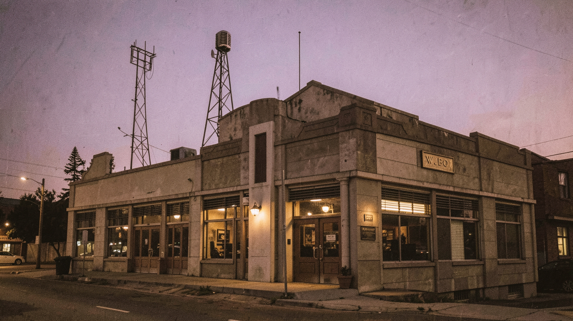 A 1930s art deco radio building in downtown Baton Rouge with a plaque reading WJBO